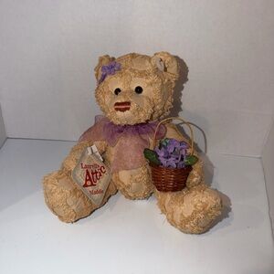 Laurell’s Attic Maddie Chenille Plush Teddy Bear Purple Flowers in Basket